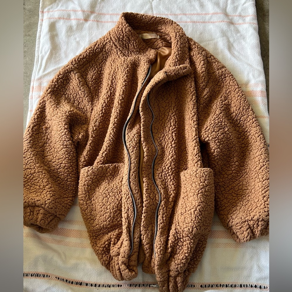 Red and tan teddy jackets